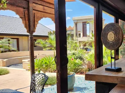 a view from the front porch of a house at Bella Bohemia Spa, Venue and Guest Farm in Roodeplaat