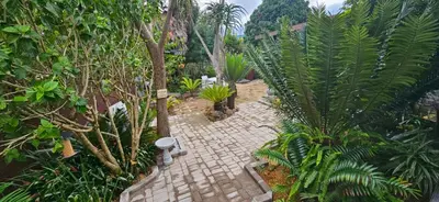 an overhead view of a brick walkway in a garden at Havana Nights in Graskop