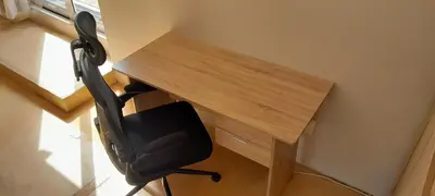 a desk with a black office chair next to a window at Joy Haven - Open Plan Studio in Centurion