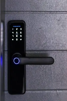 a close up of a black door handle on an object at Luminant Escapes - with power backup in Midrand