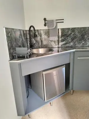 a kitchen with a sink and a counter top at 20 on Middle in Polokwane