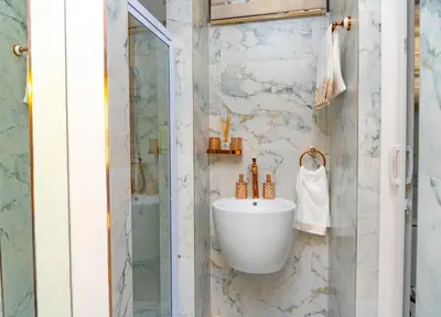 a bathroom with a sink and a shower at Homes of Ace Studio 1 in Pretoria