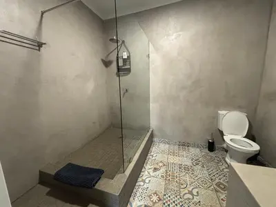 a bathroom with a shower and a toilet at 59 van Heerden in Mokopane