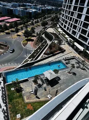 an overhead view of a swimming pool in a city at Waterfall Peaceful Oyster in Midrand