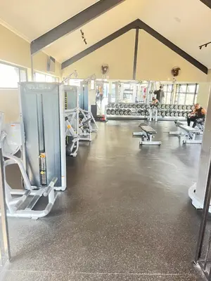 a gym with a lot of chairs and machines at Large 3 Bedroom Apartment in Midrand, Waterfall City - More space than a hotel room - Ideal for families, groups and work trips - 20 Elizabeth Place in Midrand