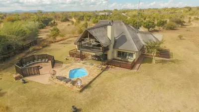 an overhead view of a house with a pool at Sunshine Retreat @ Zebula in Mabula