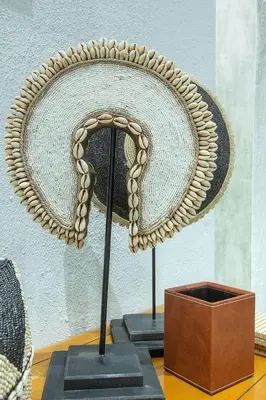 a hat on a stand on a wooden table at Cheetah Plateau in Marloth Park
