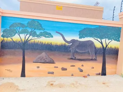 a mural of an elephant on the side of a building at Muzee Wethu Accommodations in Armburg