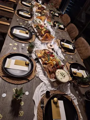 a long table with plates of food on it at 22 Siyanda Mabalingwe in Mabula