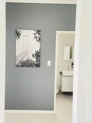 a picture of the golden gate bridge on a wall in a bathroom at 2Bedroom Luxury Family Living Space in Midrand in Midrand