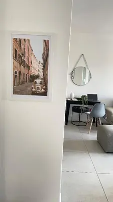 a living room with a picture on the wall at 2Bedroom Luxury Family Living Space in Midrand in Midrand