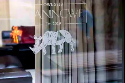 a sticker of an elephant on a glass door at Maningwe in Marloth Park