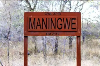 a sign that says mannesve on it at Maningwe in Marloth Park