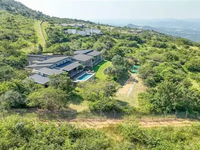 an aerial view of a house on a hill at Southern Sun Hotels in Tongwe