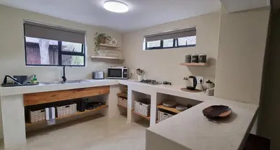 a kitchen with a sink and a counter top at Buffalo Thorn Villa next to Kruger National Park in Marloth Park