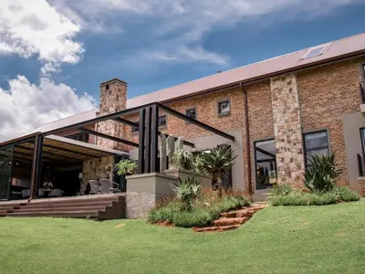 an exterior view of a brick building at Whiskey Creek in Dullstroom