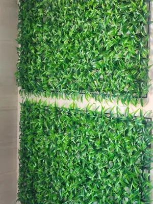 a cake with green grass on top of it at Olympus Side in Pretoria