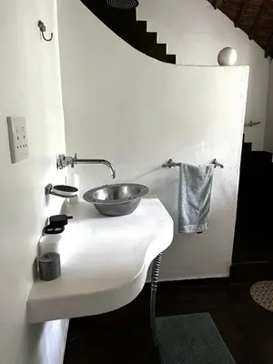 a sink with a bowl on top of it at Wood Valley in Midrand