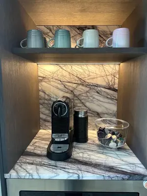 a coffeemaker sitting on a shelf in a kitchen at Rattlesnake Weir in Dullstroom