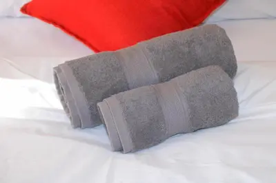 a bandaged up limb sitting on top of a bed at Vuyani Guest Lodge in Malamulele