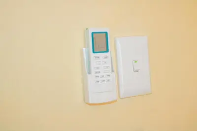 a calculator and an ipod on a wall at Vuyani Guest Lodge in Malamulele
