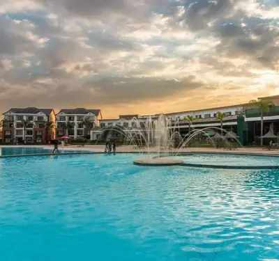 a large swimming pool with a fountain in the middle at 521 at The Blyde in Pretoria