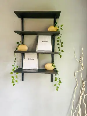 a shelf with fruits and vegetables on a wall at Serenity in the city - one bedroom apartment in Pretoria