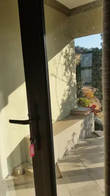 an open door with a view of a stairway at Jackal Buzzard Mountain Haven in Hillsowen