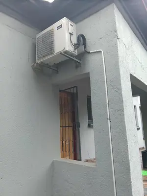 a air conditioner on the side of a building at Buffalo guest lodge in Bushbuckridge