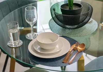 a glass table with a cup and a bowl on it at Zalari Luxe 93 on New, Carlswald, Midrand in Midrand