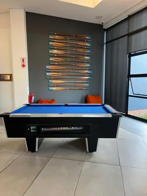 a billiard room with a blue pool table at The Blyde Bliss in Pretoria