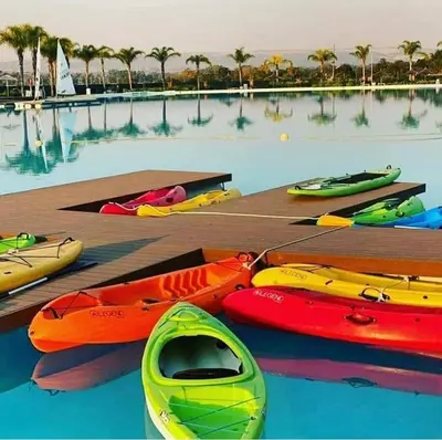 a group of kayaks on a dock in the water at The Blyde Bliss in Pretoria