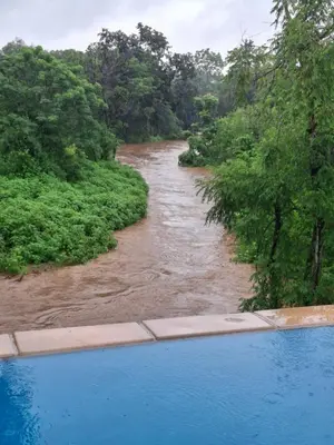 a view of a river with a pool of water at Modern Apartment on Letaba River in Tzaneen