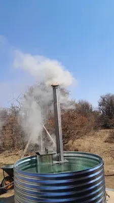 a steam cylinder with smoke coming out of it at Thirty-Three Dinokeng Big 5 with a hot tub in Klipdrift