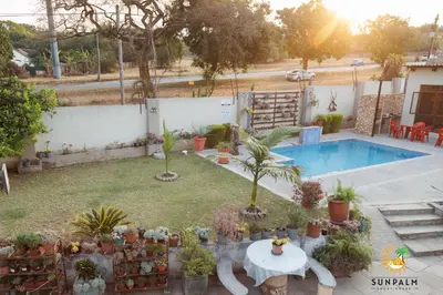 an overhead view of a backyard with a pool and plants at Sunpalm Guesthouse in Nelspruit