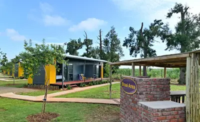 a house with a sign on the side of it at SleepOver Malelane in Malelane