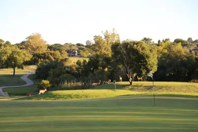 a view of a golf course with a green at Fairview Manor in Modimolle