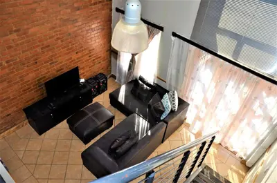 an overhead view of a living room with a couch at Calswald's Skyline Sanctuary in Midrand