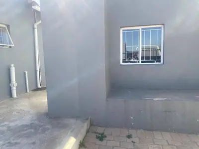 a building with a window on the side of it at The Royal Kyota in Sandton