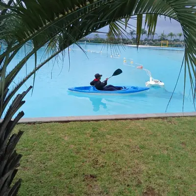 a person in a kayak in the water at The Blyde 2-Bed Luxe Apartment in Pretoria