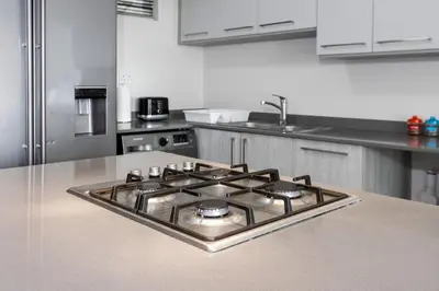 a kitchen with a stove top in a kitchen at Fredas Place 92 On New in Midrand