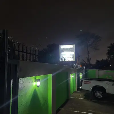a truck parked in a parking lot at night at Delapaix Guest lodge in Kempton Park