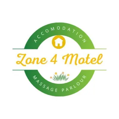 a green logo for a village plantation with a tree at Zone 4 Motel and spa in Polokwane