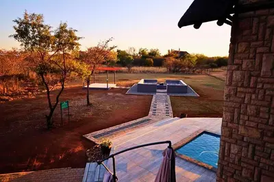 an overhead view of a swimming pool in a yard at Zebula Bush Lodge 47 in Moheme