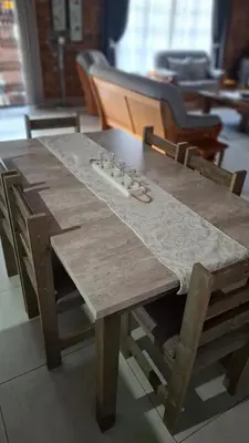 a wooden table with a chess board on top of it at The Big Tree selfcatering accommodation in White River