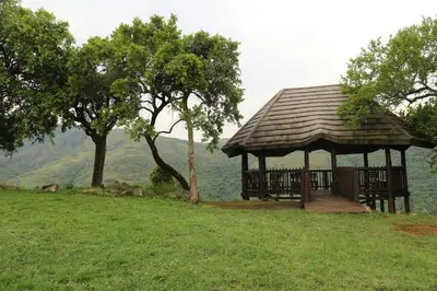 a gazebo with a view of the water at Tanda Kutula Mountain Lodge in Guthrie