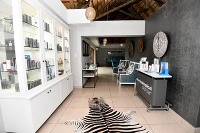 a zebra rug on the floor of a salon at aha Skukuza Safari Lodge in Skukuza