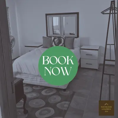 a bedroom with a bed with a book now sign on it at Kanyamazane Guesthouse 1214 in eNyamazaneni