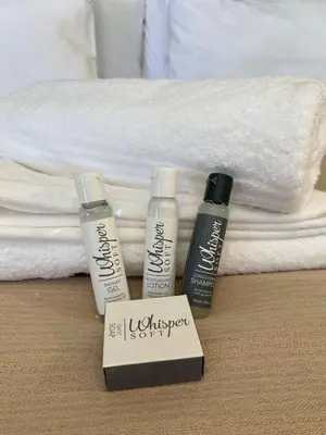 a group of three products sitting on top of a bed at Khenjadji at Fish Eagle Bay in Warmbaths