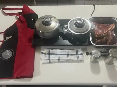 a counter with two pots and a pan of food at Kremetart Villa in Alldays
